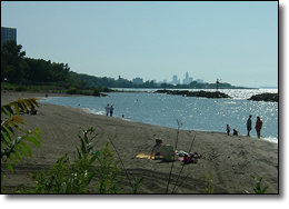 The beach at Euclid Creek provides views of the Downtown skyline.